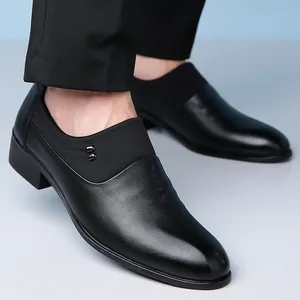 Classic black leather slip-on business shoes for men with smooth finish and low heel