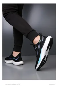 Close-up of black breathable mesh sneaker with light blue dynamic lines and cushioned sole