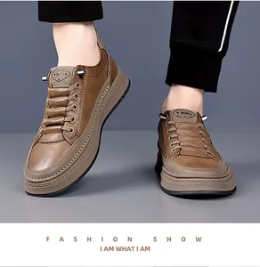 Close-up of brown casual men's sneakers with lychee texture and stitched thick soles