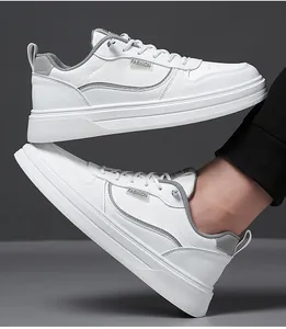 Detailed side view and on-foot look of white slip-on sneakers with fashion text detail