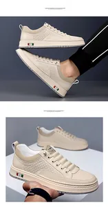 Detail showing beige men's sneakers with diamond woven texture and side flag detail