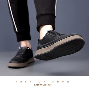 Close-up of litchi grain leather texture and non-slip rubber sole on men's casual shoes