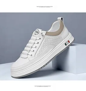 Detail showing white leather sneaker with checkered embossing and Italian flag accent