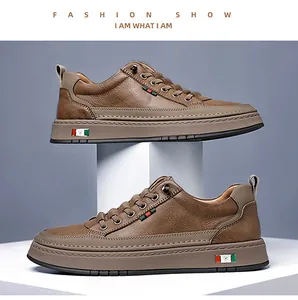 Detail of brown leather casual shoe with red and green stripe on geometric stand