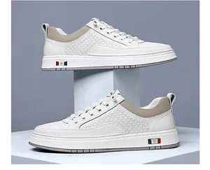 Detail view of white men's casual sneaker featuring woven texture and slip-on design