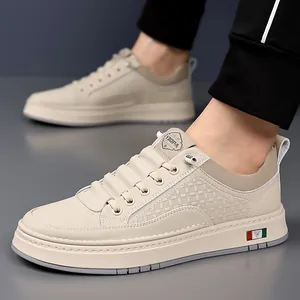 Men's cream casual slip-on sneakers with textured leather pattern and flexible rubber sole