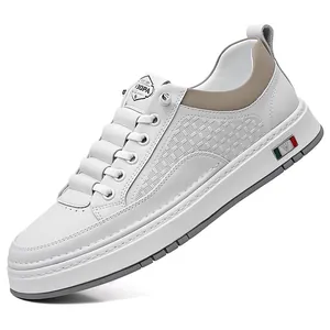 White casual men's slip-on sneakers with khaki heel trim and embossed grid pattern