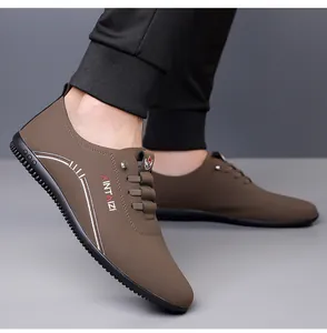 Side view of men's breathable soft sole casual slip-on driving shoes in dark brown