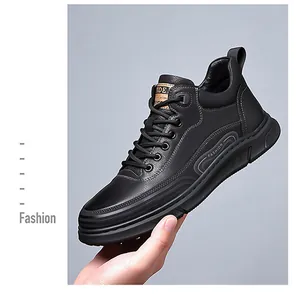 Detail view of high-top casual shoe featuring black textured leather and lace-up design