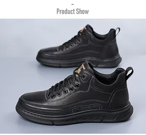 Detail of black leather lace-up sneaker with textured finish and fashion lettering