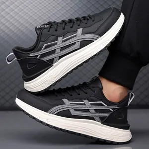 Baskets de sport décontractées noires pour hommes avec semelles blanches à vagues