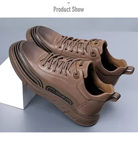 Detail of men's brown high-top sneaker with textured leather and fashion logo print