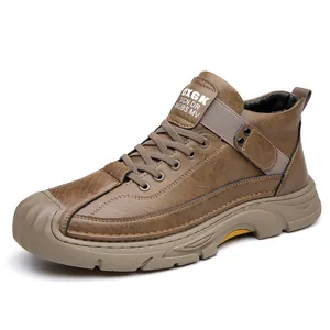 Brown leather mid-top hiking shoes with thick rubber sole and lace-up closure for men