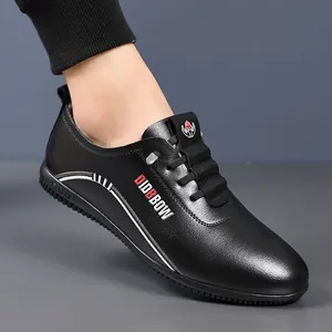 Men's black leather loafers with red-white side accents and flexible soft sole for driving