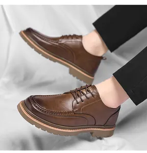 On-foot view of brown brogue shoes showing pebble grain leather and thick rubber soles
