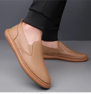 Macro detail of brown textured leather slip-on shoes with durable rubber sole