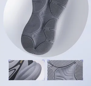 Detailed view of the anti-slip durable sole pattern and side profile of grey sports shoes