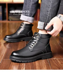 Detail of men's black leather winter boots with lace-up style and non-slip thick sole