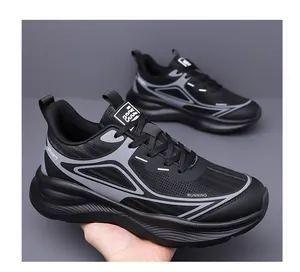 Detailed shot of breathable black mesh running shoe featuring a thick sport sole