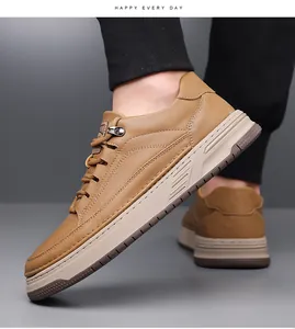 Detail view of khaki pebbled leather sneakers with chunky sole and wave pattern accents