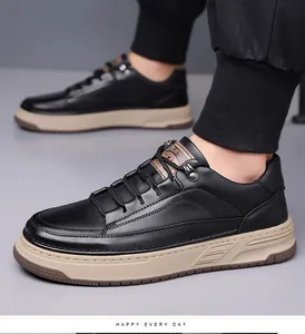Detail of men's black pebbled leather sneakers with chunky sole and lace-up closure