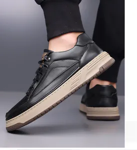 Detail view of black faux leather texture and thick multi-color sole on men's vintage sneakers