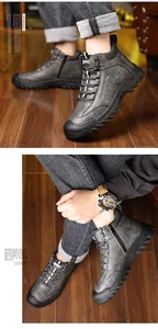 Detailed view of men's winter high-top boots with side zipper and premium leather texture