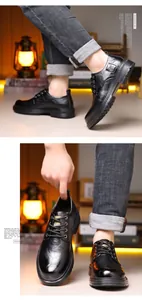 Detail of men's black lace-up leather shoes featuring thick anti-slip rubber soles