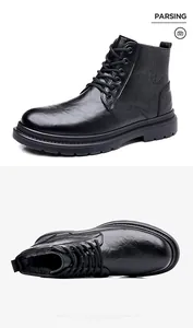 Detail eines schwarzen Leder-Schnürboots mit geprägtem Logo und rutschfester Profilsohle