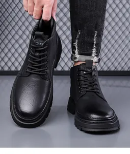 Detailed view of men's high-top leather boots with non-slip rubber soles and lace-up design