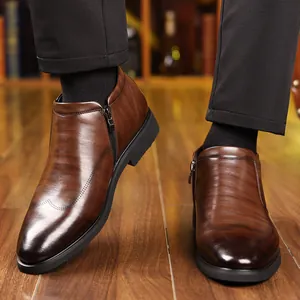Men's brown leather business boots with brogue detailing and side zipper closure