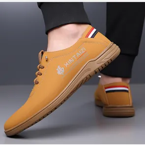 Detail view of mustard yellow leather casual shoes with embossed character and anti-slip sole