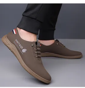 Detail view of brown leather casual shoe featuring non-slip sole and decorative heel strap