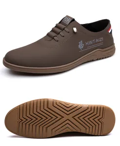 Detailed side view of brown leather casual loafers with slip-resistant rubber sole texture