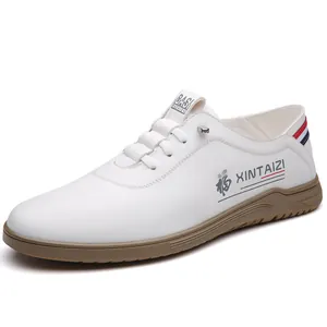 Chaussures décontractées blanches pour hommes avec semelle en caoutchouc marron et lacets
