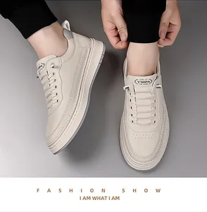 Détail de baskets basses beige avec lacets et logo Good Luck sur la languette