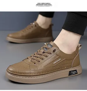 Close-up of brown casual leather sneakers with white typography and non-slip thick soles