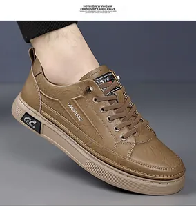 Detail shot of brown men's casual sneakers featuring leather texture and thick rubber soles