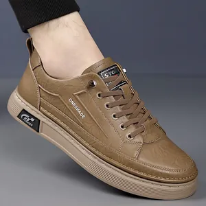 Men's dark brown casual sneakers with pebbled leather texture and thick rubber sole
