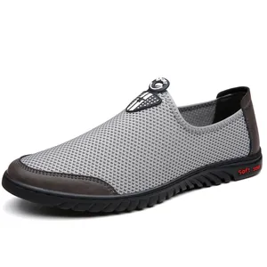 Ademende grijze mesh sneakers voor heren met zachte zolen en casual slip-on ontwerp