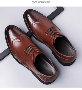 Top view of dark brown wingtip brogue dress shoes with premium polished leather texture