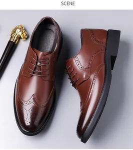 Close-up of brown leather Brogue shoes with classic wingtip carving and lace-up detail