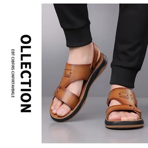 Detail of brown leather men's sandals with GOBBLER embossed logo and thick rubber sole