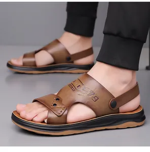Close-up of brown leather sandals with rivet details and sturdy anti-slip rubber soles