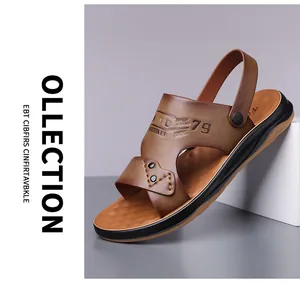 Detail view of brown leather sandals with adjustable heel strap and embossed branding