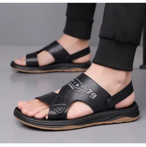 Detail of men's leather sandals with adjustable heel strap and non-slip rubber sole