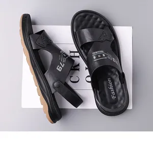 Detail of men's black criss-cross leather sandals with dual-color non-slip soft soles