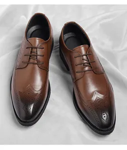 Macro detail of brown leather Brogue shoes with exquisite wingtip carvings and gradient finish