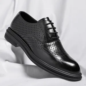 Classic black Brogue oxfords with decorative perforations and a thick sole for men
