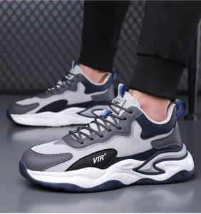 Close-up of lightweight grey mesh breathable sneakers with blue synthetic leather details
